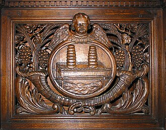 carved oak panel adorning a communion table of the Church of Our Lady in Céroux-Mousty, Belgium